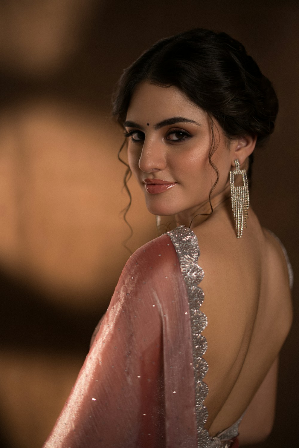 Pink saree with a silver embellished border